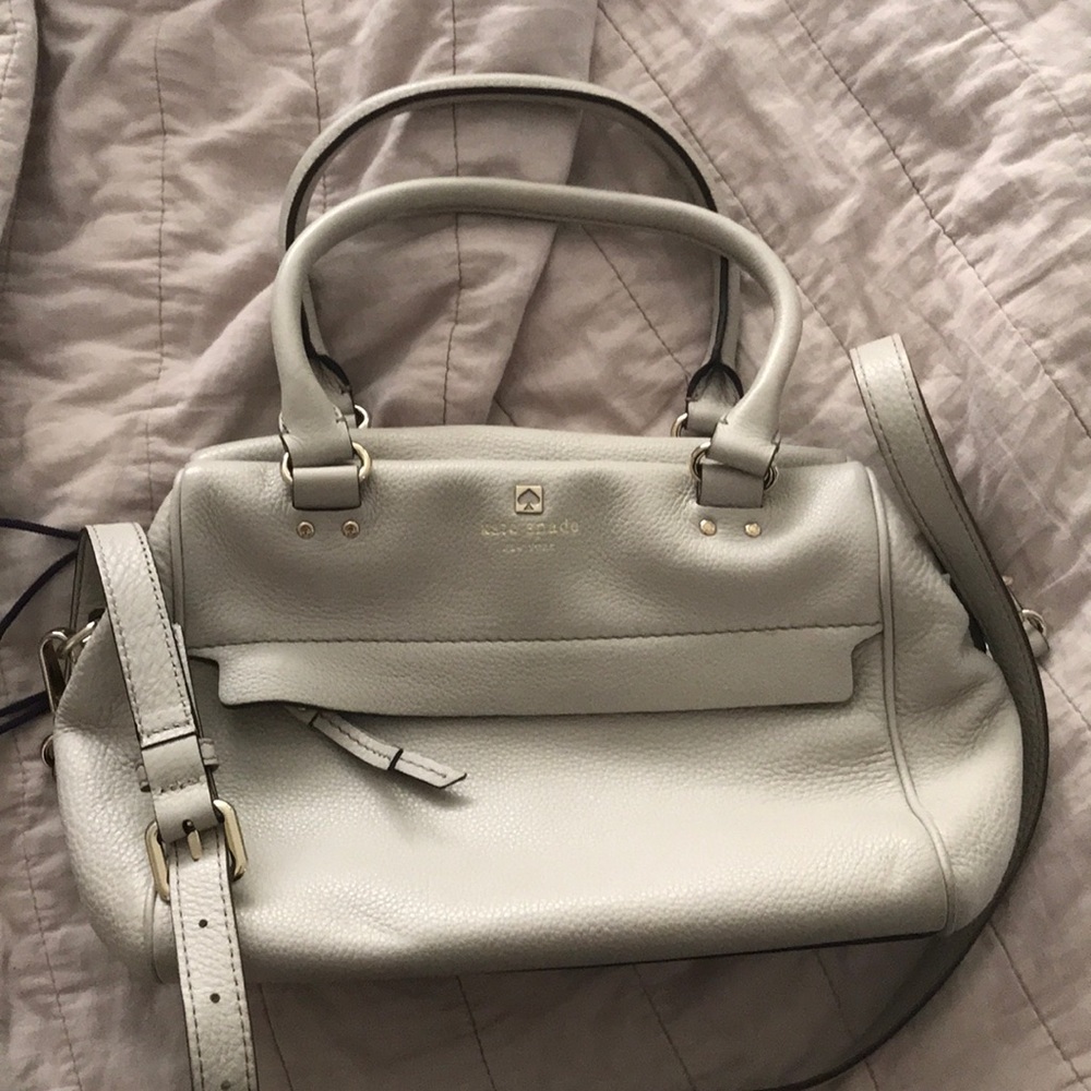 Cream Kate spade purse with cross body strap